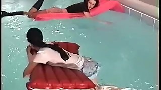 Skirts and Boots Swimming in Pool