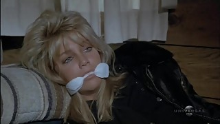 Heather Locklear is a tied up policewoman